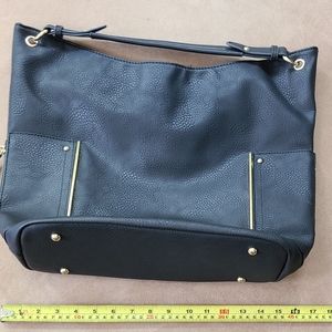 Large open zippered women's tote bag